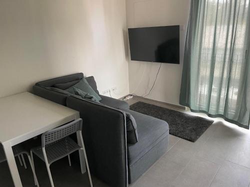 Una televisión o centro de entretenimiento en Int. Appartment Kolbermoor