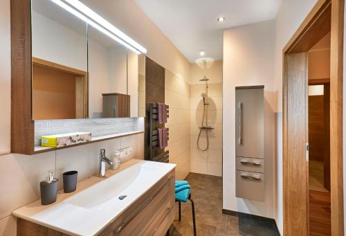 Ein Badezimmer in der Unterkunft Ferienwohnungen Schiltenstein