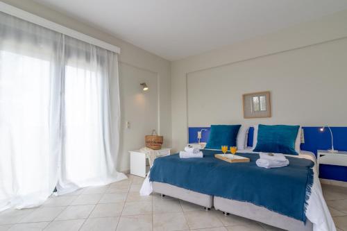 Una cama o camas en una habitación de GT Beach