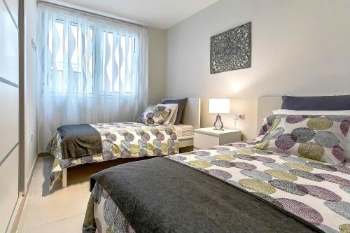 Krevet ili kreveti u jedinici u okviru objekta Hortensia Suites Apartments ,Los Cristianos