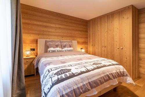 Postel nebo postele na pokoji v ubytování Haus Mirador by Zermatt Premium Apartments