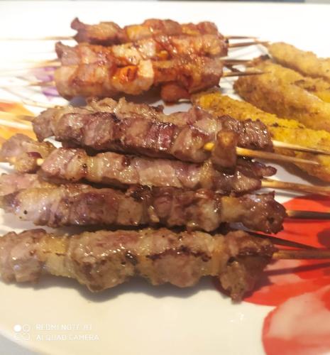 a group of skewers of food on a plate at Casa vacanze nel Parco Nazionale della Majella in Montenerodomo