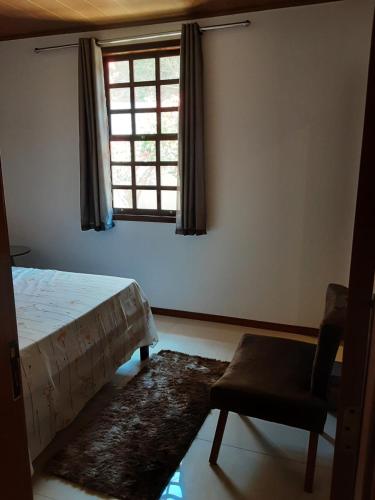 Voodi või voodid majutusasutuse Casa Charme de Lençois toas
