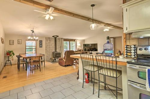 a kitchen and living room with a table and chairs at Port Jervis Home about 8 Acres with Mountain View! in Port Jervis