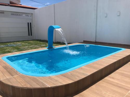 Bazén v ubytování Casa de praia completa em Milagres nebo v jeho okolí