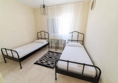 Postel nebo postele na pokoji v ubytování Castle apartment