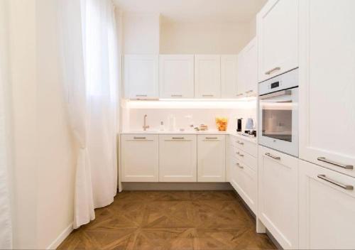 Cuisine ou kitchenette dans l'établissement Madonna Montecchi Luxury Suite in Verona