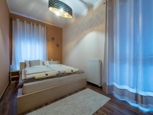 Posteľ alebo postele v izbe v ubytovaní Vila Bovec Sunrise apartment with balcony