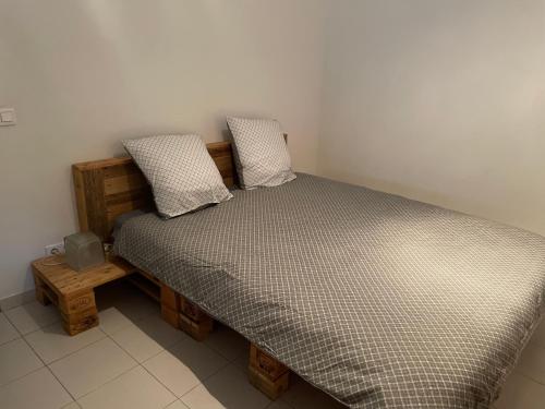 เตียงในห้องที่ Velezia Guesthouse