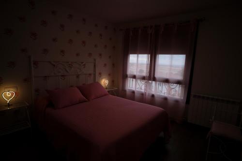 Katil atau katil-katil dalam bilik di Amanece Monegrillo Apartamentos