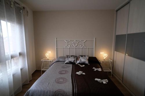 Katil atau katil-katil dalam bilik di Amanece Monegrillo Apartamentos