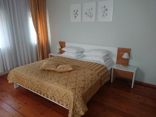 Katil atau katil-katil dalam bilik di Miško Apartments