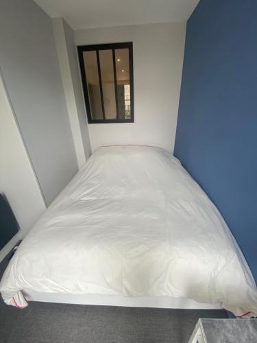 Postel nebo postele na pokoji v ubytování VIVEZ LE QUAI - St Francois - Notre Dame - PARKING