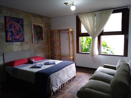 
Cama ou camas em um quarto em Hostel Kombi Curitiba - filial Jardim Botânico
