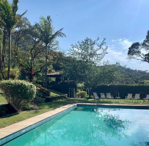 The swimming pool at or close to Pinheiros do Rocio