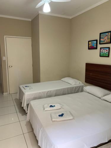 Katil atau katil-katil dalam bilik di Hotel e Pousada Areia da Praia