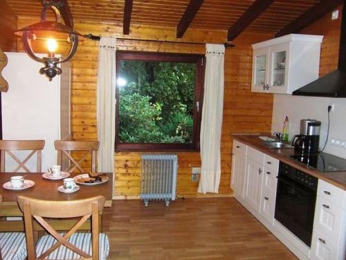 Kuhinja oz. manjša kuhinja v nastanitvi Dog friendly holiday home in the Kn ll