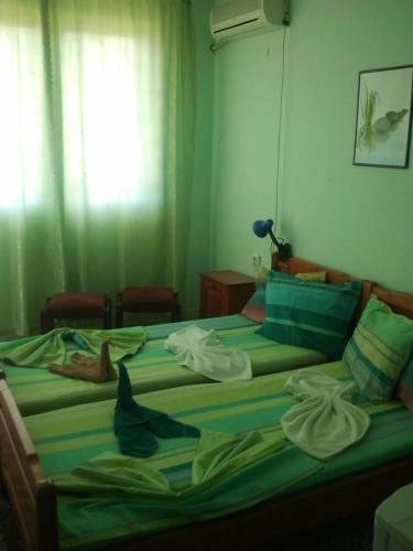 Postel nebo postele na pokoji v ubytování Hotel Strajica