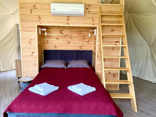 Ένα ή περισσότερα κρεβάτια σε δωμάτιο στο Planeta Glamping
