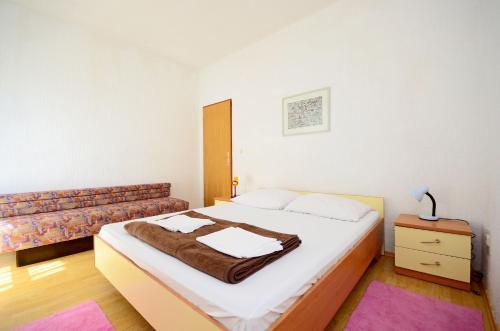 Cama o camas de una habitación en Apartments Marinko