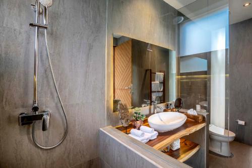 a bathroom with a sink and a shower at Villa Florentine by BaliSuperHost in Ubud