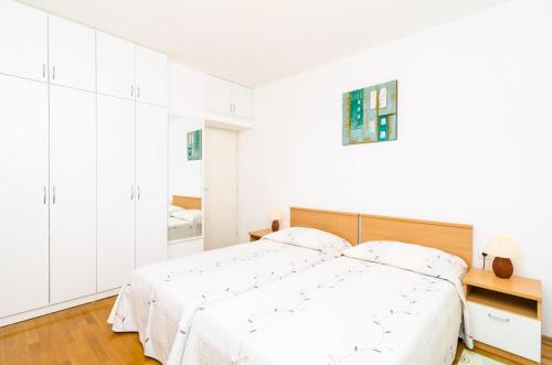 Posteľ alebo postele v izbe v ubytovaní A4-harmony Apartment Close To The Sunset Beach And Lapad Promenade