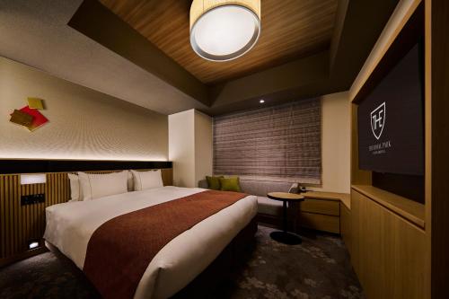 Кровать или кровати в номере The Royal Park Hotel Kyoto Umekoji