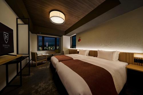 Кровать или кровати в номере The Royal Park Hotel Kyoto Umekoji