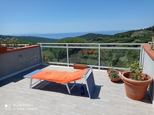 En balkong eller terrass på Vista sulle isole dell'arcipelago Toscano