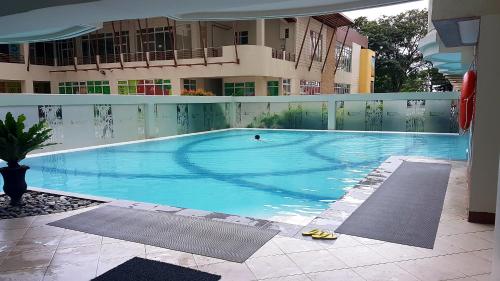 The swimming pool at or close to The Red Keep Condotel Tagaytay Cityland Prime Residences with 55in 4k TV & Netflix