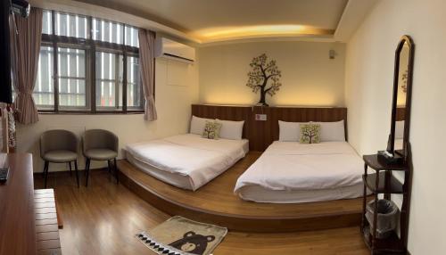 Krevet ili kreveti u jedinici u okviru objekta Oriental Hotel