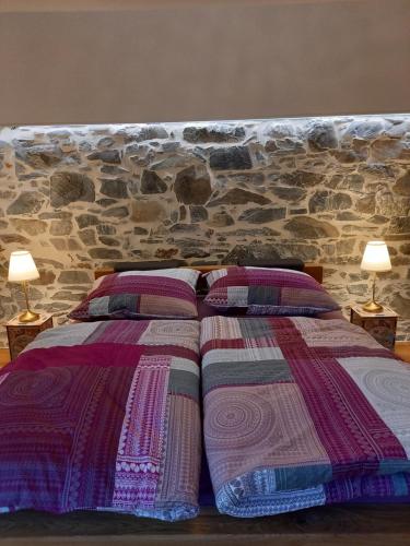 En eller flere senge i et værelse på Landhaus Grünjuwel