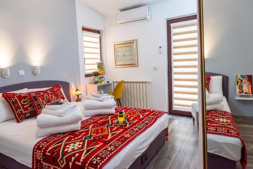 Postel nebo postele na pokoji v ubytování Hotel Vamos Sarajevo, b&b