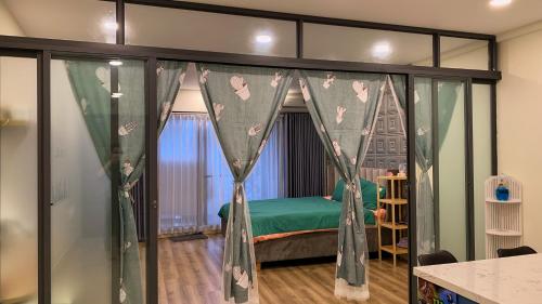 מיטה או מיטות בחדר ב-Căn hộ cao cấp chung cư Gateway Vũng Tàu