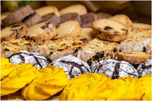 a bunch of donuts sitting on top of a table at Ani Grand Hotel Yerevan in Yerevan