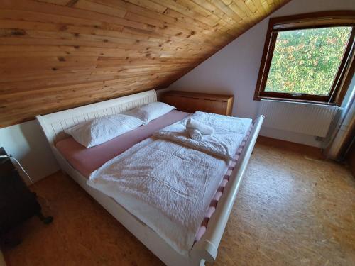 Postel nebo postele na pokoji v ubytování Czech Paradise Village