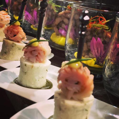 a bunch of food on plates on a table at HVD Club Bor Ultra All Inclusive - Private Beach & Free parking in Sunny Beach
