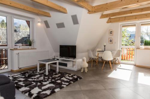 Posedenie v ubytovaní udanypobyt Apartament Widokowy