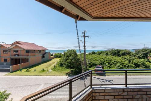 a view from the balcony of a house at Raio do Sol Residence in Bombinhas