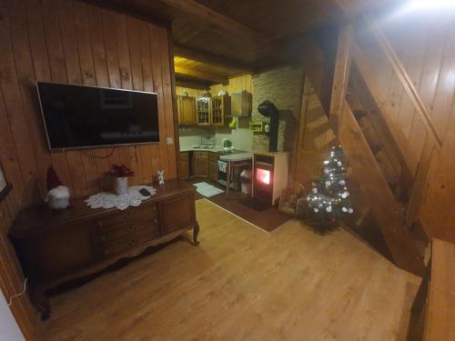 an overhead view of a living room with a christmas tree at Domek pod Królowem in Ustroń
