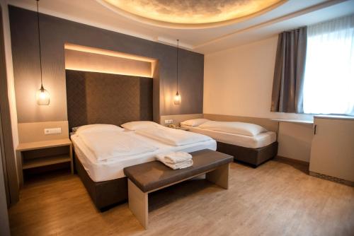 Ένα ή περισσότερα κρεβάτια σε δωμάτιο στο Hotel Chrys