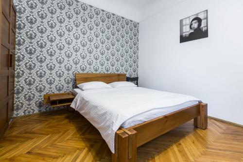 Postel nebo postele na pokoji v ubytování Апартаменти на Романчука в центрі