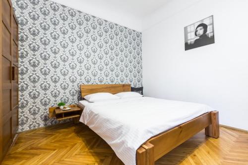 Postel nebo postele na pokoji v ubytování Апартаменти на Романчука в центрі