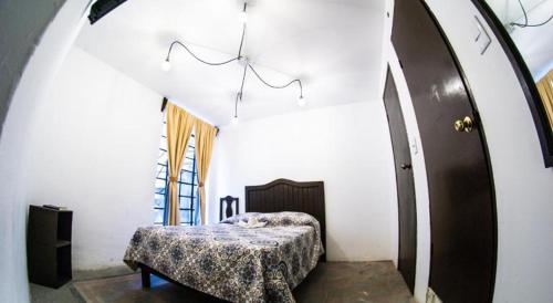 En eller flere senge i et værelse på La Fuente Catedral
