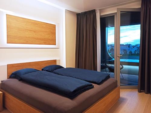 Säng eller sängar i ett rum på New modern 2 bedrooms apartment in Bratislava