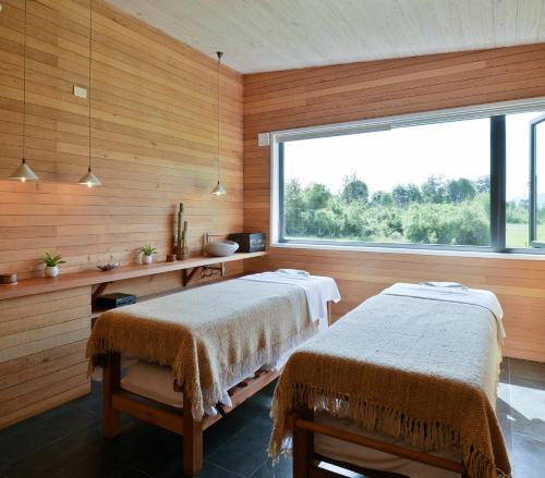 Postel nebo postele na pokoji v ubytování Futangue Hotel & Spa