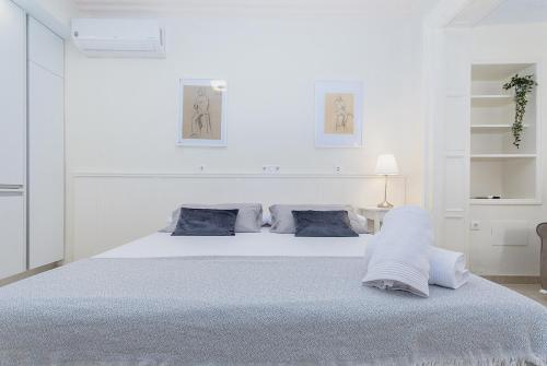 En eller flere senge i et værelse på Apartamento San Pascual 18 III en Orihuela