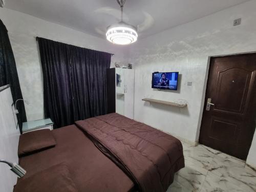 Postel nebo postele na pokoji v ubytování CG Apartments