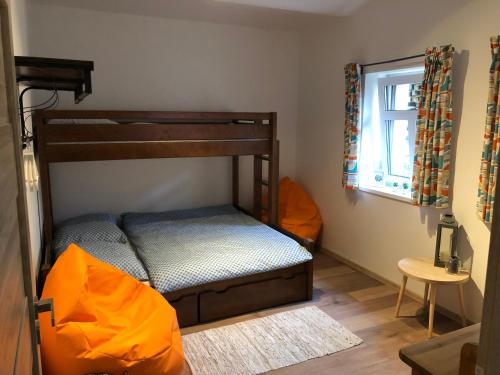 Postel nebo postele na pokoji v ubytování Apartmán DUO Plešivec