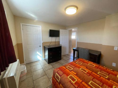 Voodi või voodid majutusasutuse Anchor Motel toas